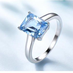 RECTANGULAR 8 X 10 SKY BLUE CUBIC ZIRCONIA RING
